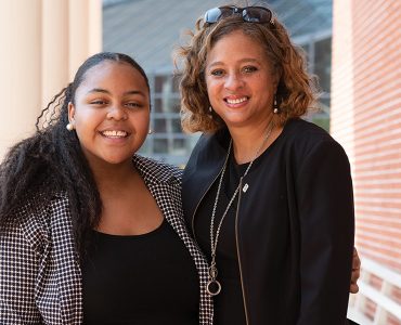 Lynijah Russell, who joined the program in 2017, and one of her mentors, founding UMB CURE Executive Director Robin Saunders.