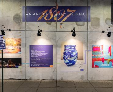 Work from the first edition of “1807: An Art and Literary Journal” is displayed on Pearl Street.
