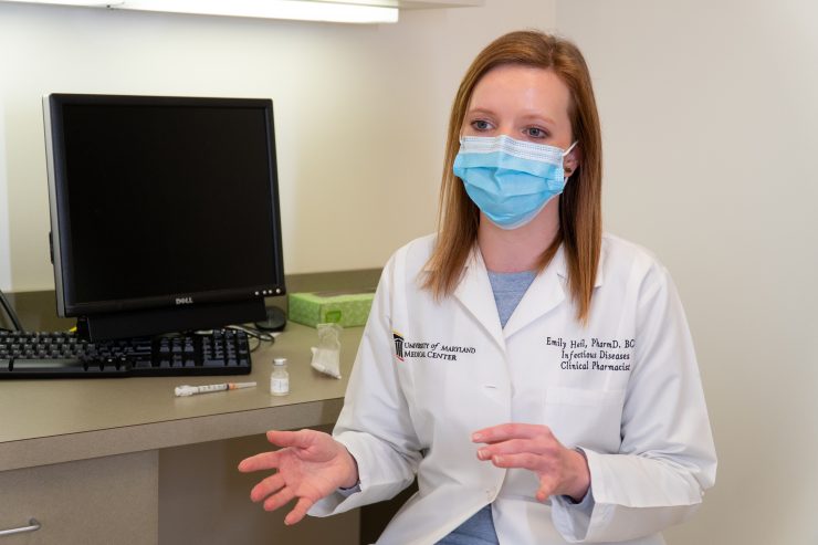 “Initially, there were no national treatment guidelines,” says Emily Heil, PharmD, MS. “As pharmacists, we relied on each other and our professional societies, talking to others across the country.” Photo by Mandy Wolfe