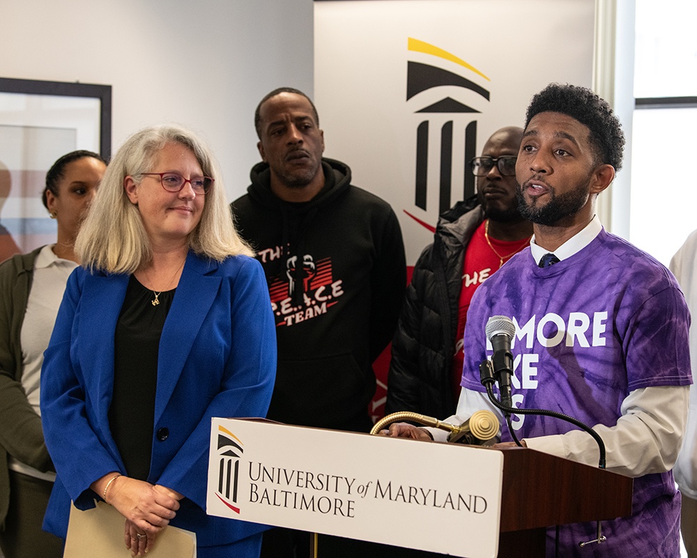Kyla Liggett-Creel, Baltimore Mayor Brandon Scott, and Embrace Resource Center partners celebrate the opening of the center’s new space in January 2024.