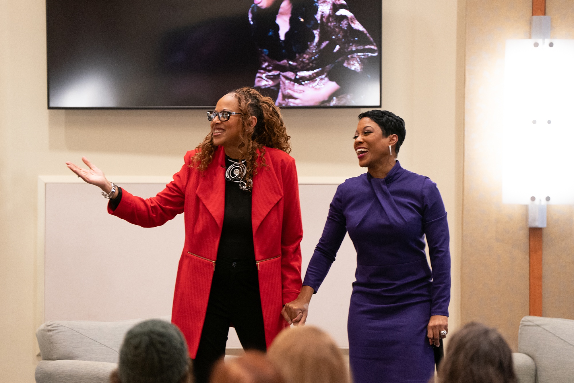 The Washington Post’s Michelle Singletary, MS (left), who writes “The Color of Money” personal finance column, and Tisha Edwards, JD ’01, MSW ’00, president/CEO of the Maryland Bankers Association and member of the University System of Maryland Board of Regents.