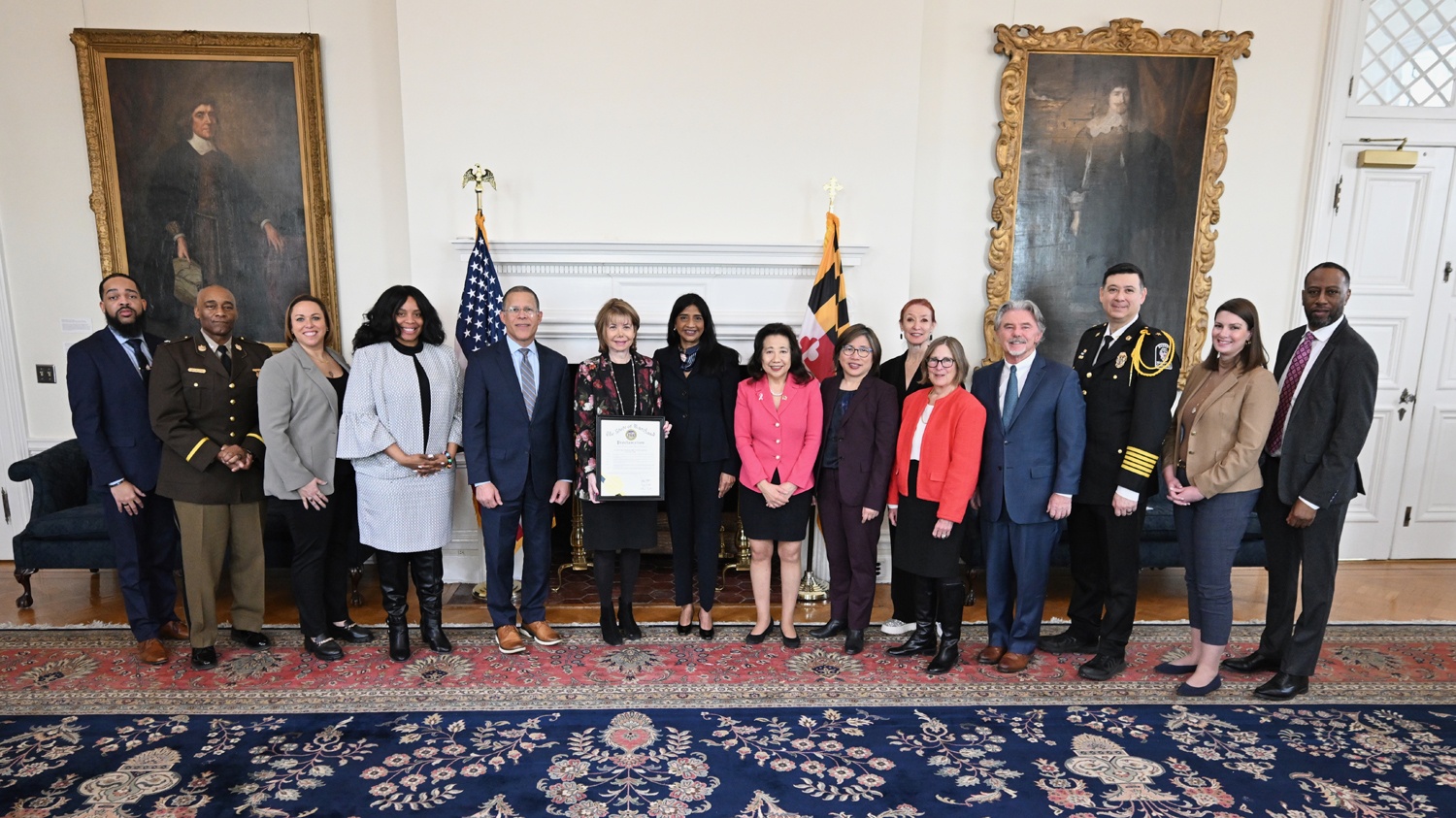 Susan Esserman, JD (sixth from left), founder and CEO of the University of Maryland SAFE Center, at an event with lawmakers and leaders from state and local government and social service and faith organizations committed to the fight against human trafficking.